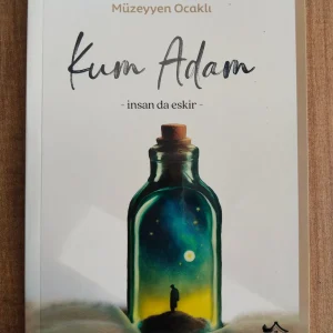 Kum Adam - Müzeyyen Ocaklı